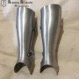 Titanium greaves